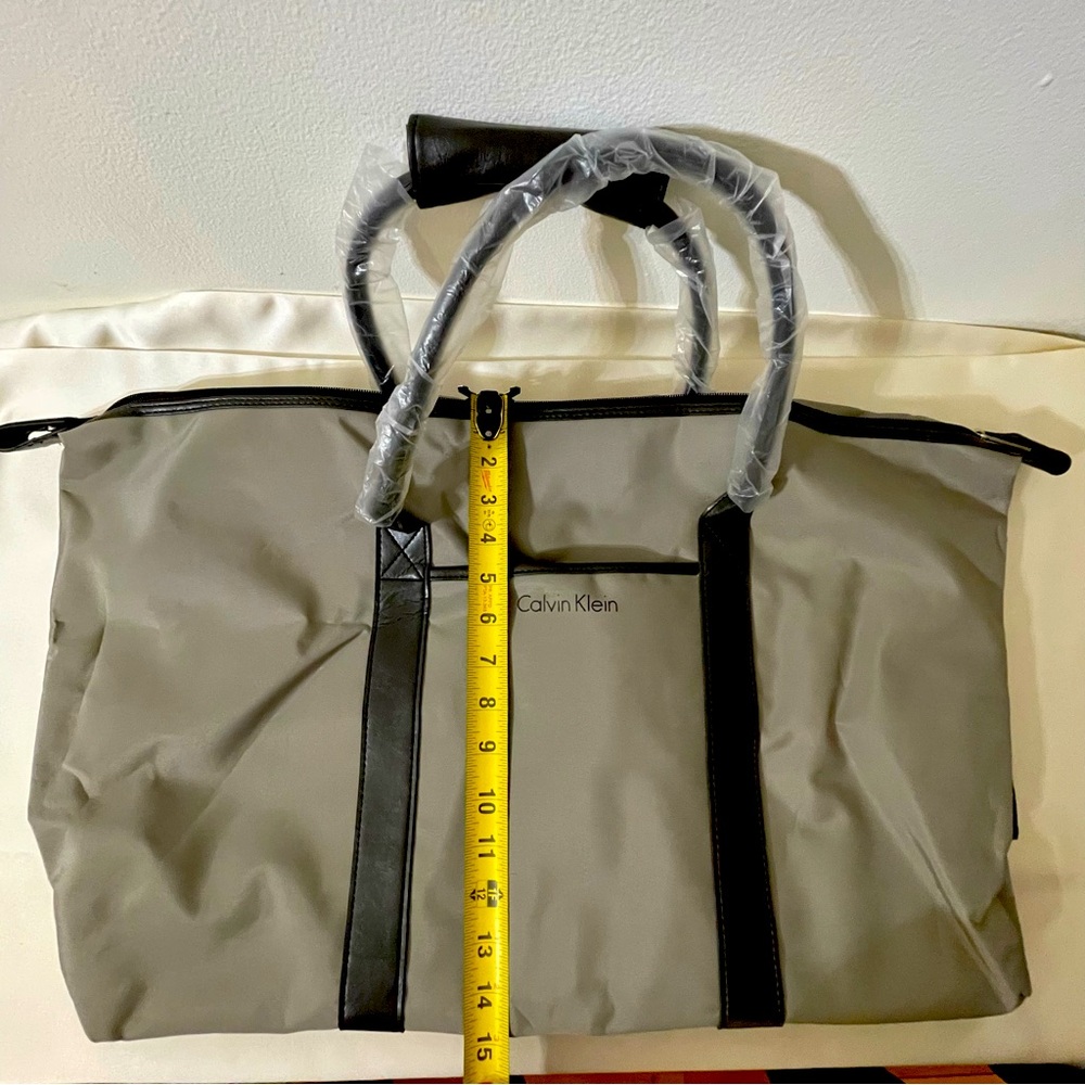 Calvin Klein weekend bag.tan color.